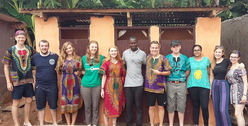 The Ackworth School group The group from Ackworth School posing for a photo in front of the finished toilet block in Ghana