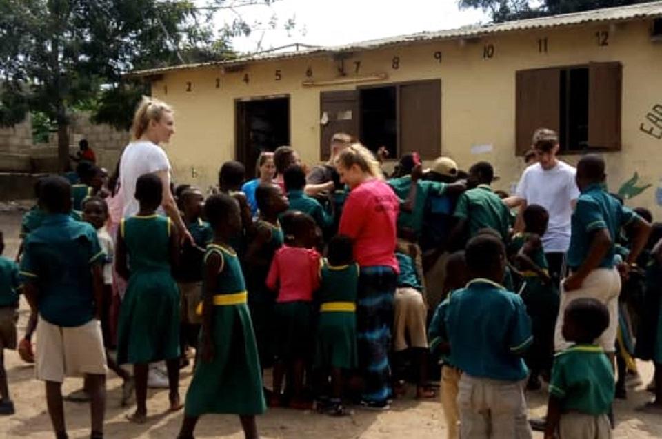 The school kids and volunteers Group of school children