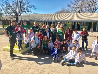 The Young Farmers group working with the school children in Argentina The children from the Doctor Horacio Garcia School posing with the Young Farmers group.