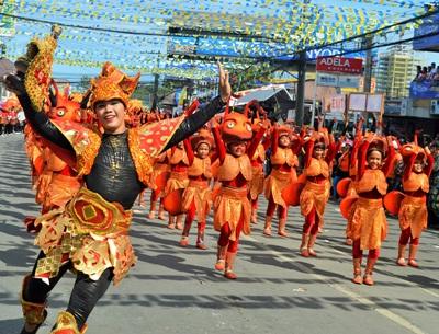 Locals during the Sinulog festival in the Philippines, Asia Locals perform at the Sinulog festival in the Philippines